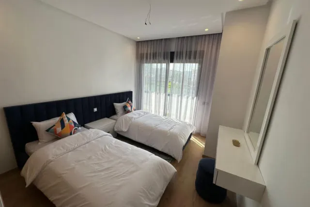 Appartement 100 m² à louer à Tanger – 2 chambres avec garage.