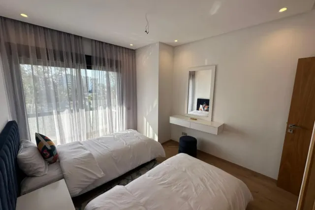 Appartement 100 m² à louer à Tanger – 2 chambres avec garage.